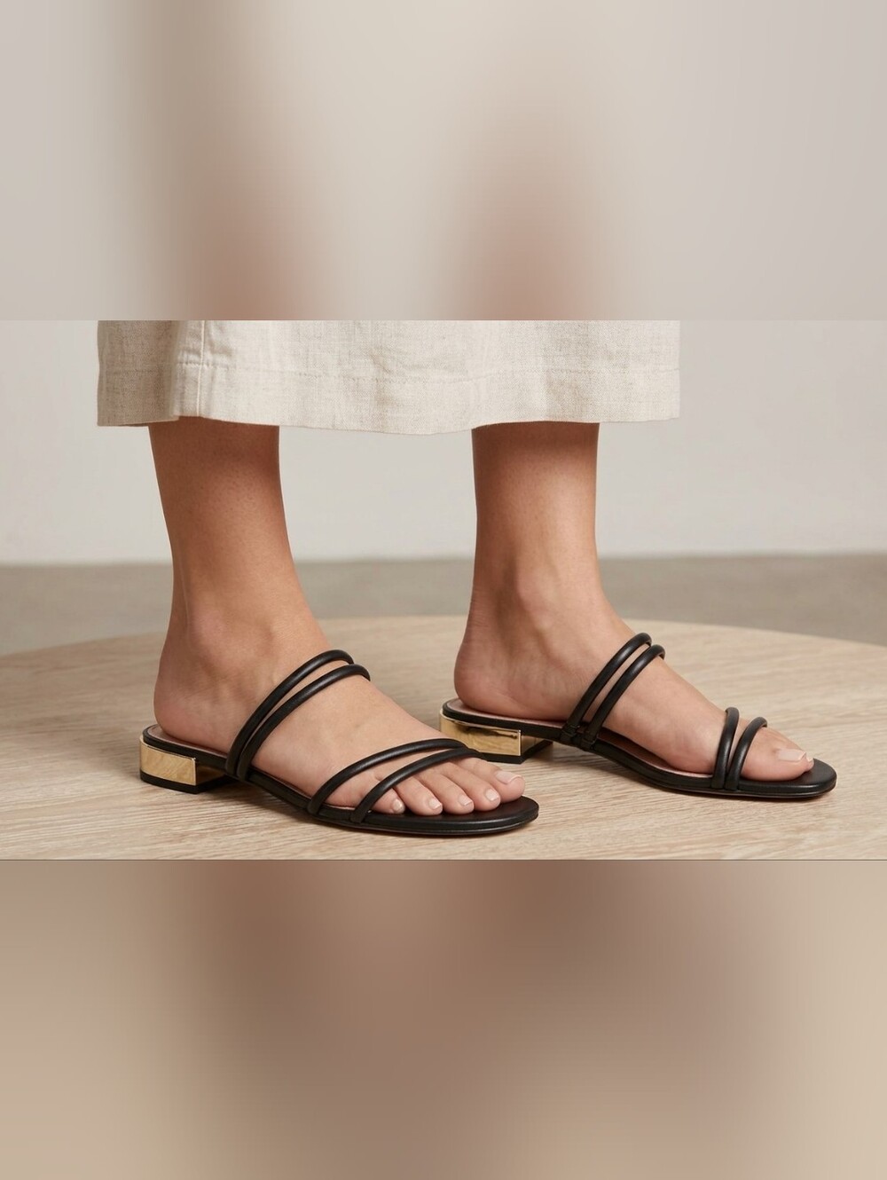 New BCBGeneration Black Strappy Slide Mules with Gold Block Heel Accent